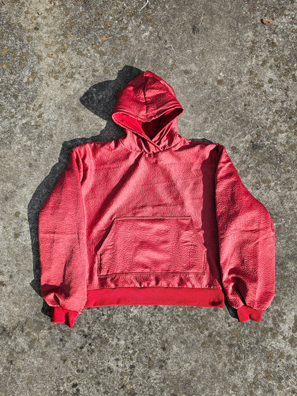 wrinkled red hoodie