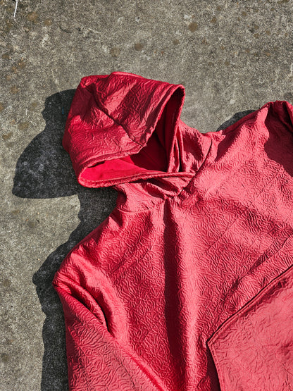 wrinkled red hoodie