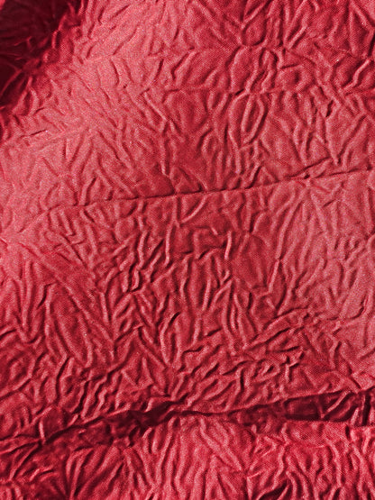 wrinkled red hoodie