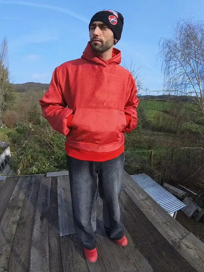 wrinkled red hoodie