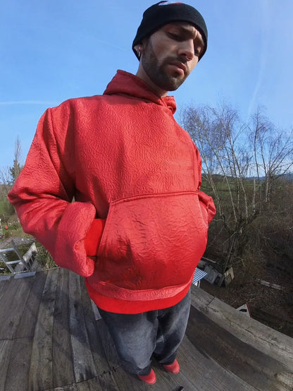 wrinkled red hoodie